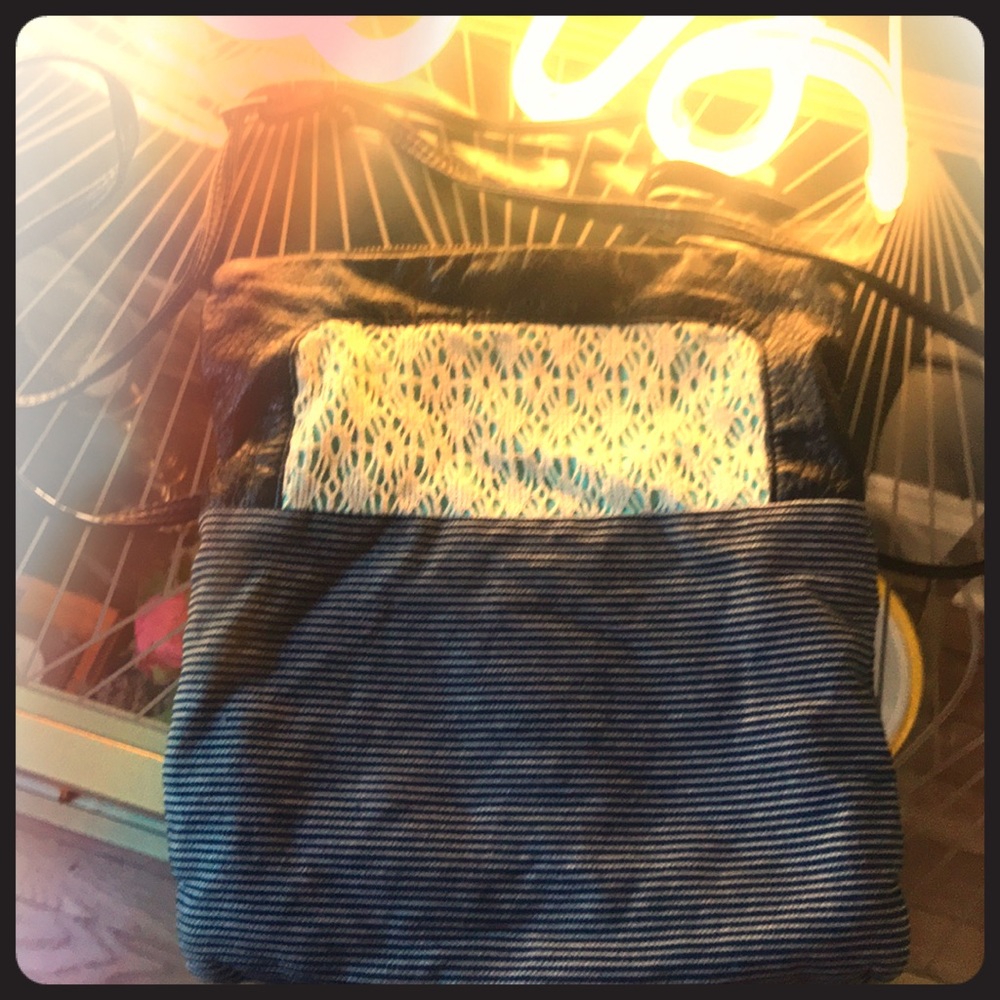 Dakine cross body/over shoulder purse.